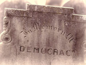 In Memory of Democracy inscribed on a headstone
