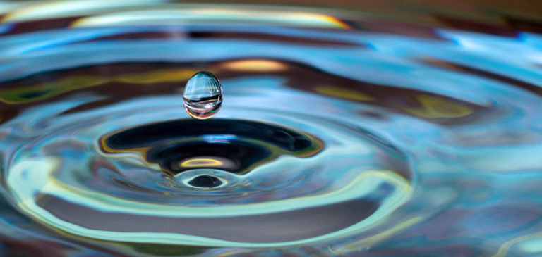 Multiply Your Impact - Image of Water Drop and Expanding Concentric Circles