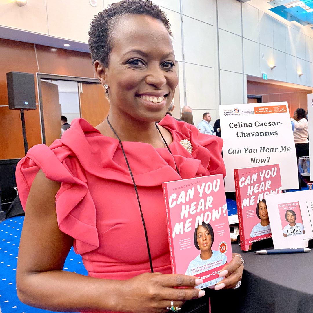 #ILA2023Global Participant Celina Caesar-Chavannes with her book at the author showcase.