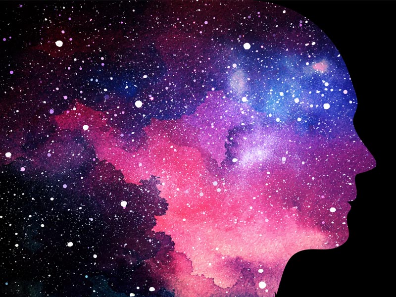 outline of head as a starry nebula