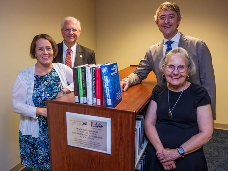 Leadership Studies Faculty of staff at CNU with ILA's Library Donation